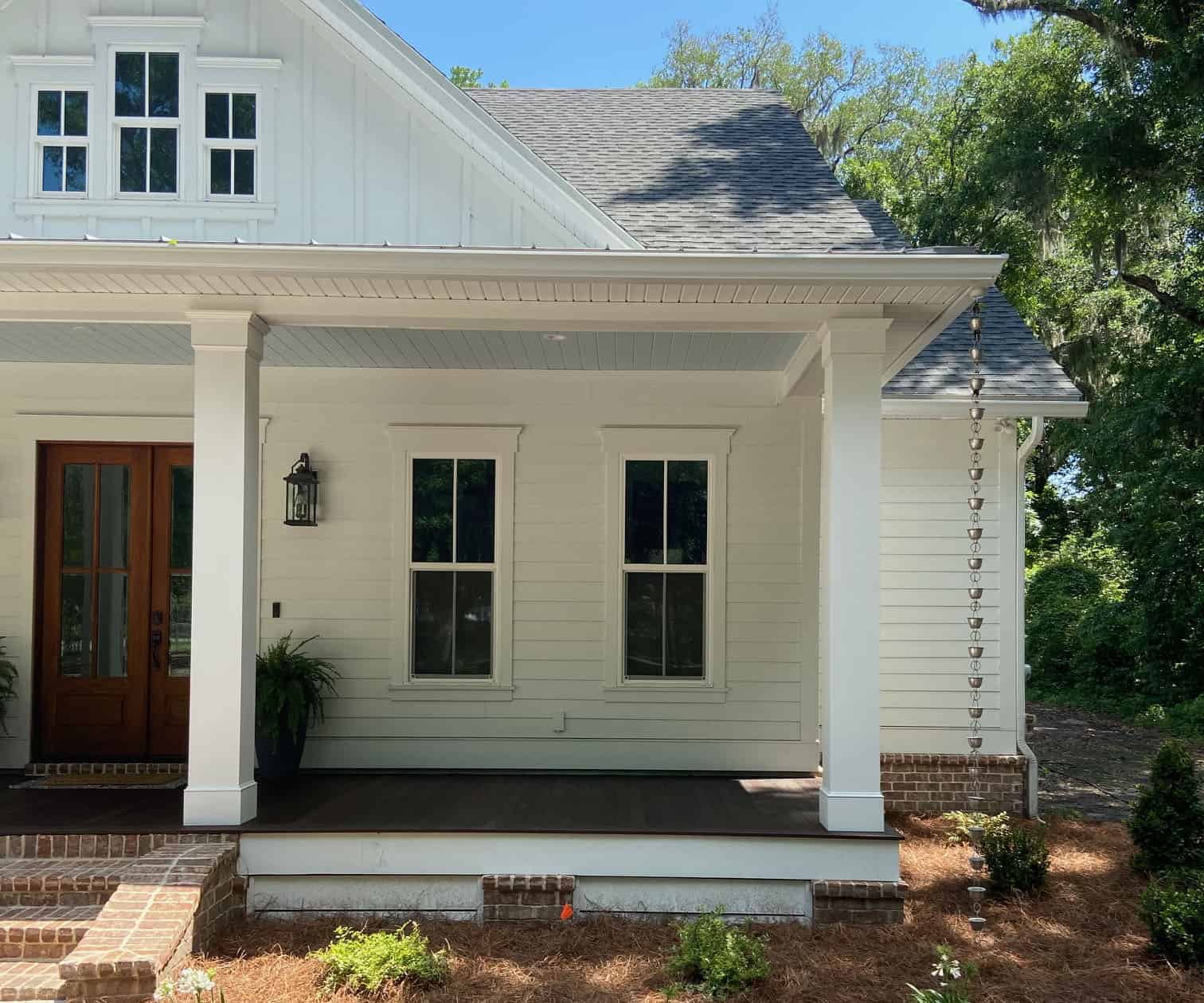 Finished landscape using Southern Living plants including Agapanthus and Boxwood