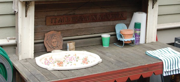 bench with paper plates and light green cup